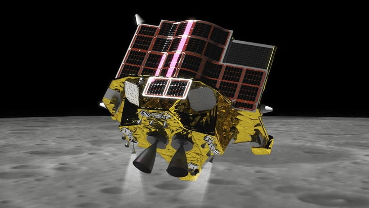 a roughly cube shaped spacecraft covered in solar panels descends to the surface of the moon