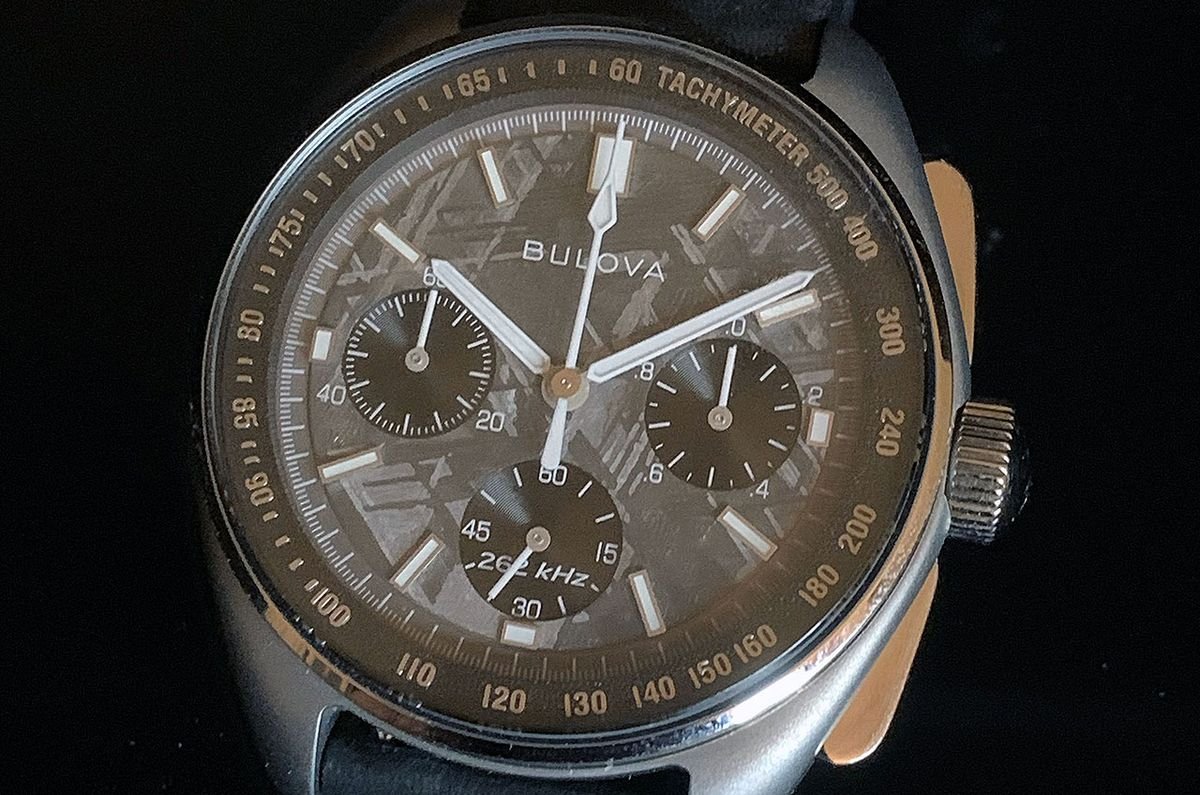 closeup photo of a bulova analog watch