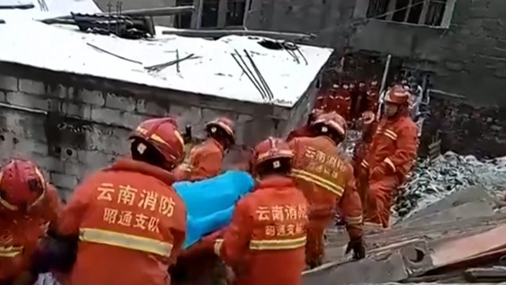 China landslide Rescuers pull survivors from rubble after 47 people buriedmp4