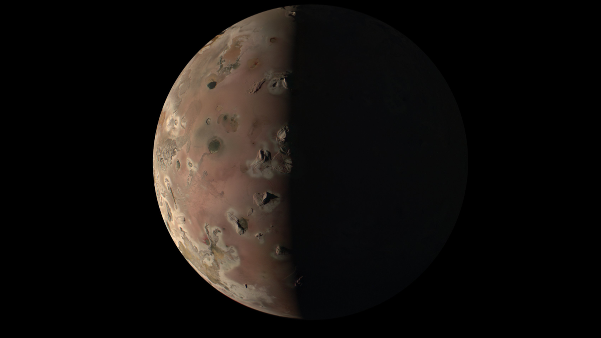 A stunning image of the volcanic moon Io as seen by Juno on Dec 30 2023