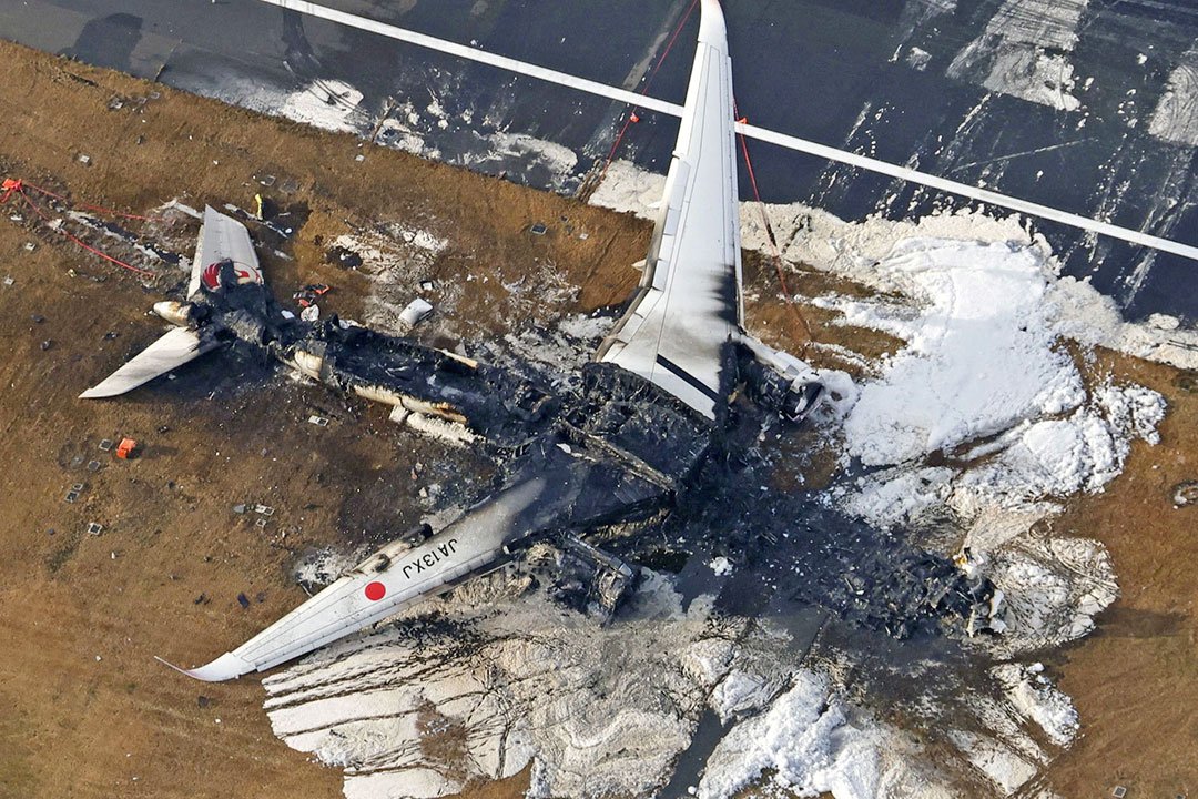 Police probe possible negligence in Tokyo airport runway collision