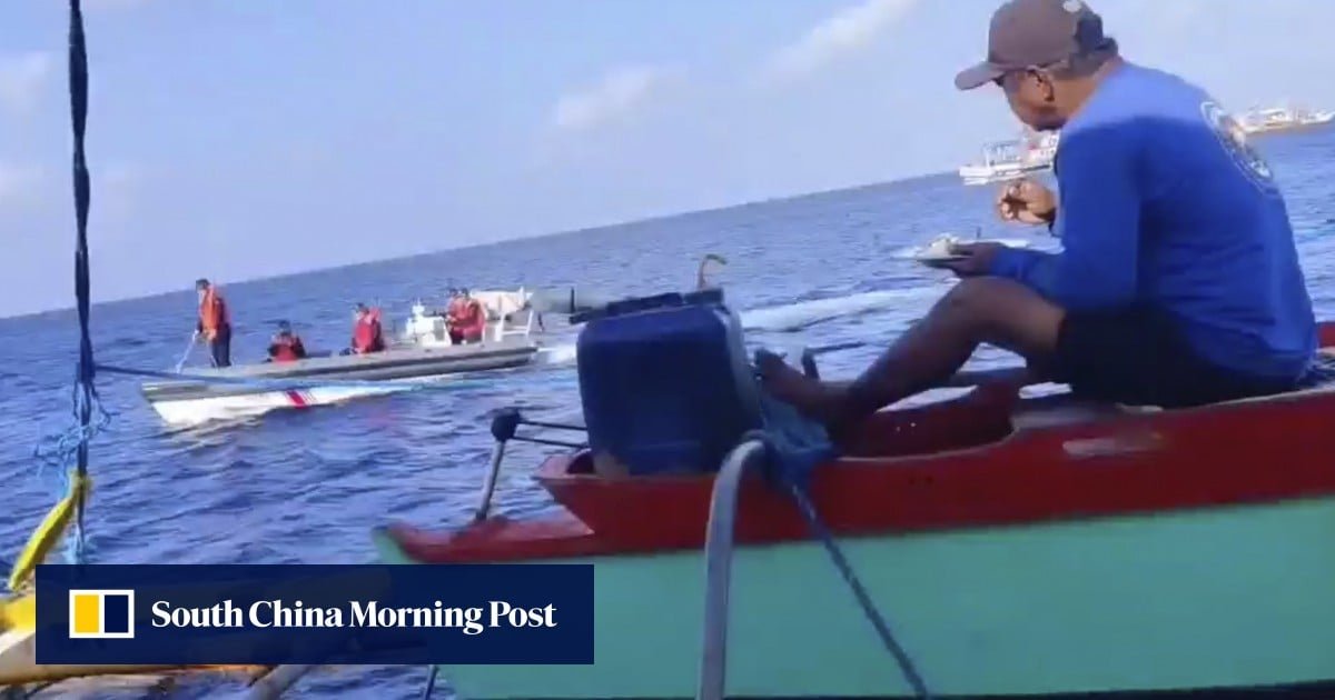 South China Sea Filipino fisherman tells Chinese ship go away from disputed shoal `this is not your territory