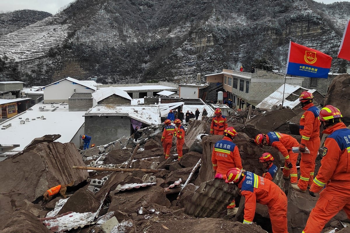 Two survivors rescued after landslide buried homes in freezing weather in southwest China, 11 died