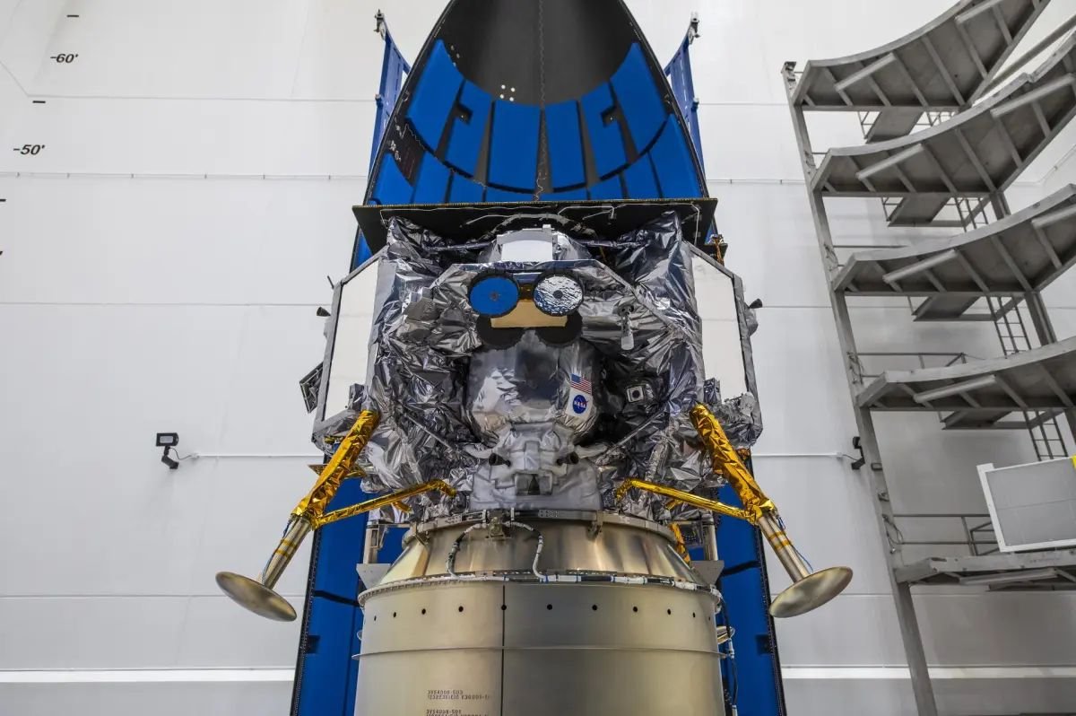 a space lander with protruding legs sits attached to its payload adapter in a white room The Peregrine lunar lander built by the Pittsburgh based company Astrobotic will launch toward the moon atop a United Launch Alliance Vulcan Centaur rocket on Jan 8
