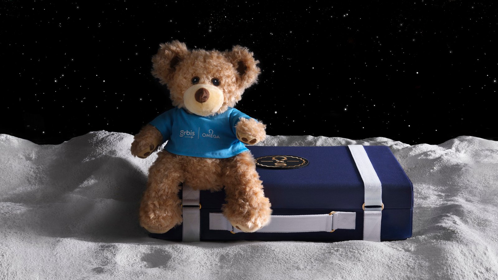 11 MoonSwatch Moonshine Gold suitcases to be auctioned at Sothebys by OMEGA for Orbis