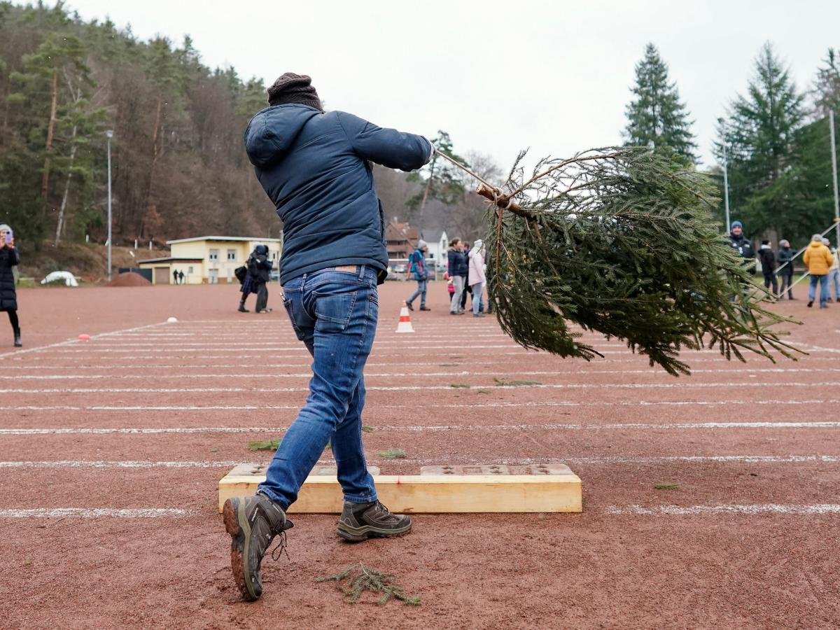 A woman lost her $823000 injury claim after lawyers found a photo of her winning a Christmas tree throwing competition