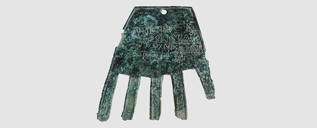Bizarre 2,000-Year-Old Bronze Hand Found Covered in Mysterious Writing : ScienceAlert