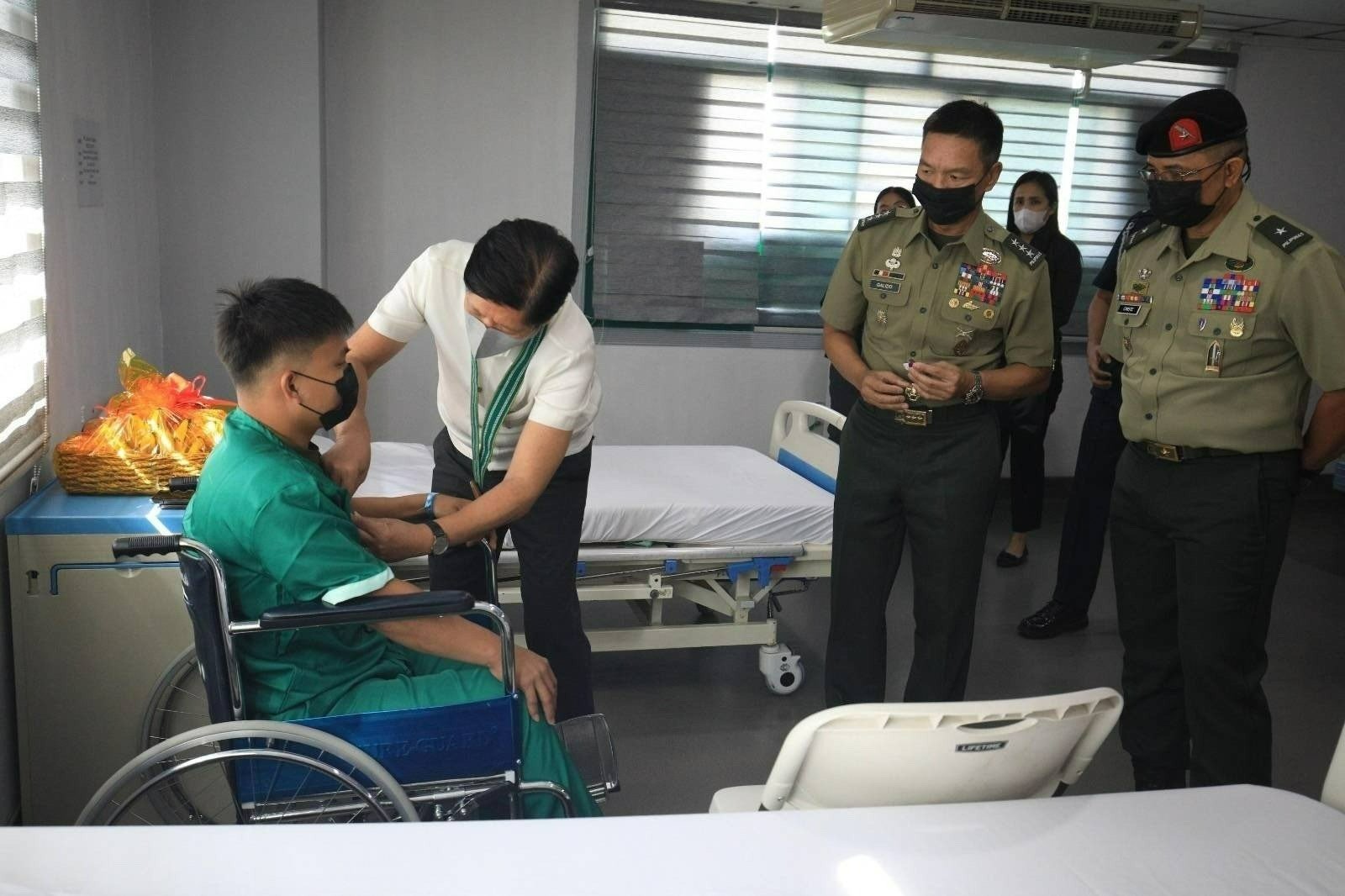 PHOTO President Ferdinand Marcos Jr awards injured soldiers with medals at the Army General Hospital in Fort Bonifacio Taguig City on Monday February 12 2024 STORY Marcos honors 4 soldiers wounded in clash with terrorists