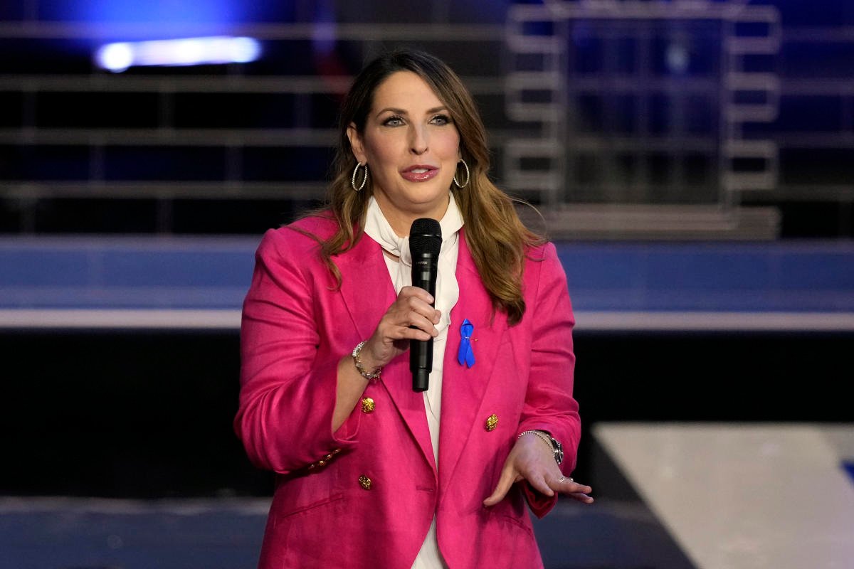 The RNC chairwoman calls for unity as the party faces a cash crunch and attacks by some Trump allies