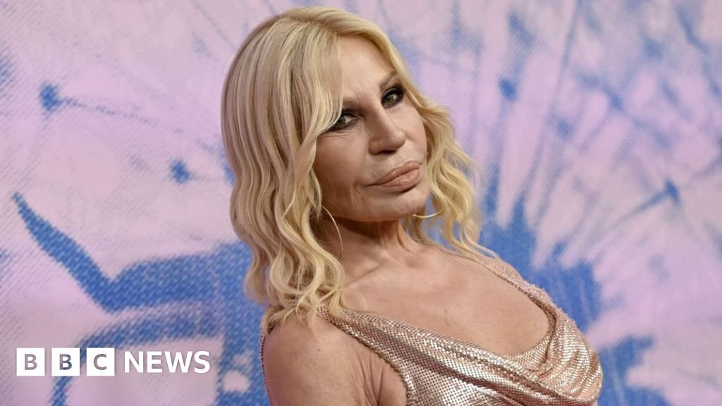 Oh my god Donatella Versace rescued from lift