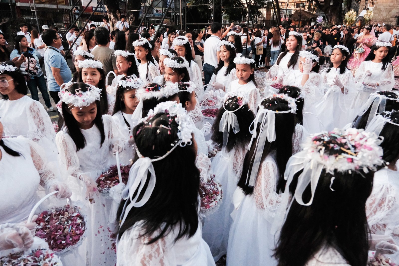 Children toss petals after the Easter Sunday morning festivities on March 31 at the Diocesan Shrine and Parish of St. Jo…