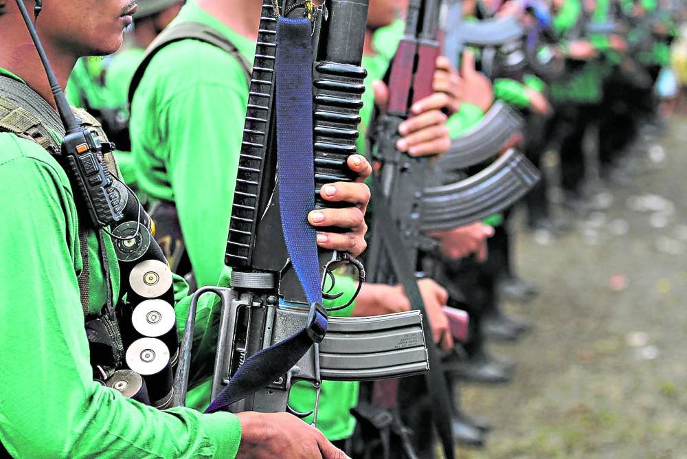 PHOTO NPA rebels in formation STORY Army remains vigilant as NPA told to mount attacks vs troops