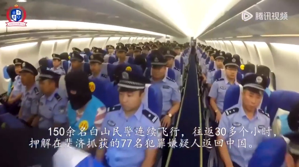 Disturbing vid shows Chinese cops snatching & shipping prisoners 6,000 miles back to Beijing on charter plane