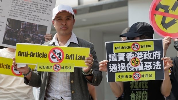 Hong Kong’s new security law comes into force amid fears it will further erode civil liberties