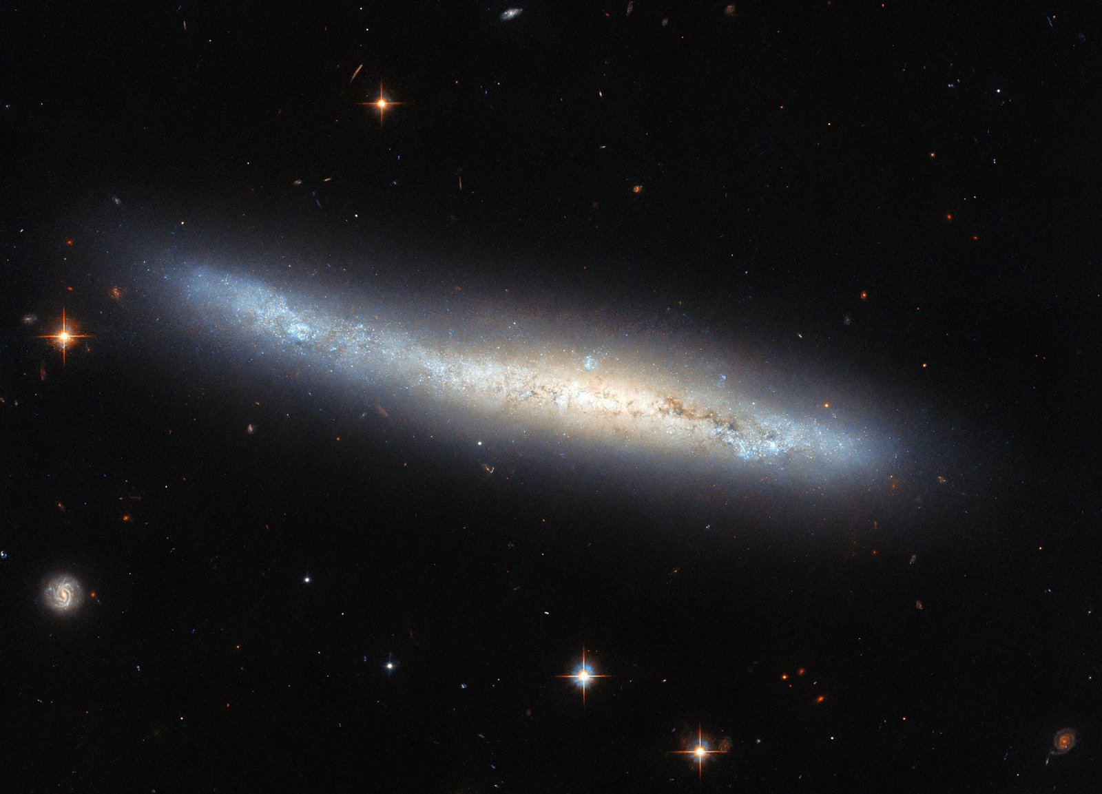 Hubble Spots a Spiral Galaxy in Disguise