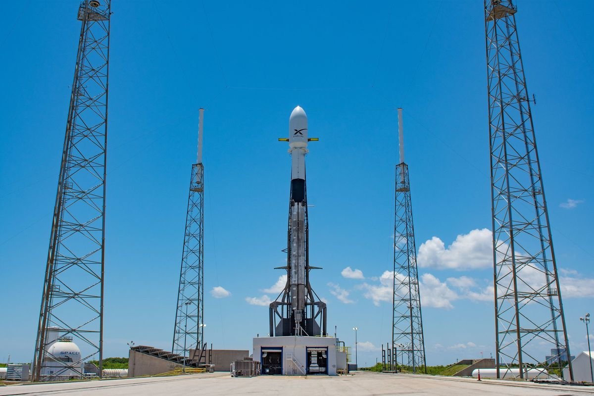 A SpaceX Falcon 9 rocket topped with 60 Starlink internet satellites on the pad at Florida