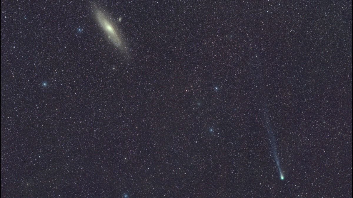a bright fuzzy dot can be seen among a background of stars leaving a wispy trail behind it