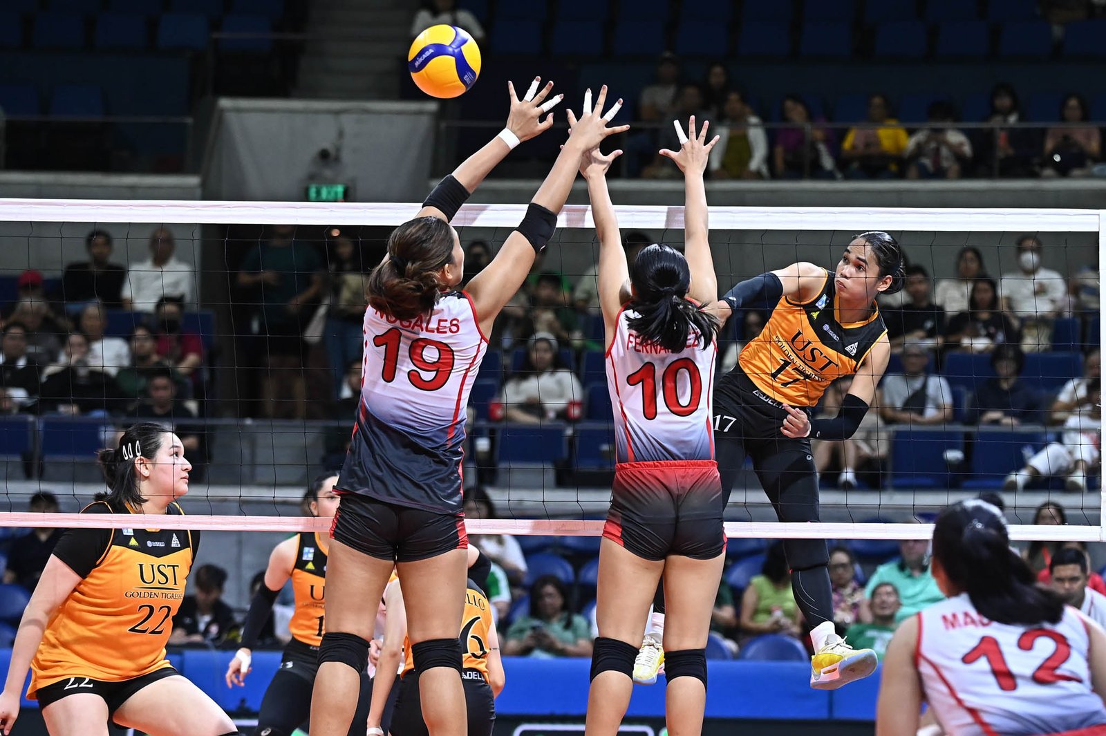 Back in full form, Poyos powers UST past UE