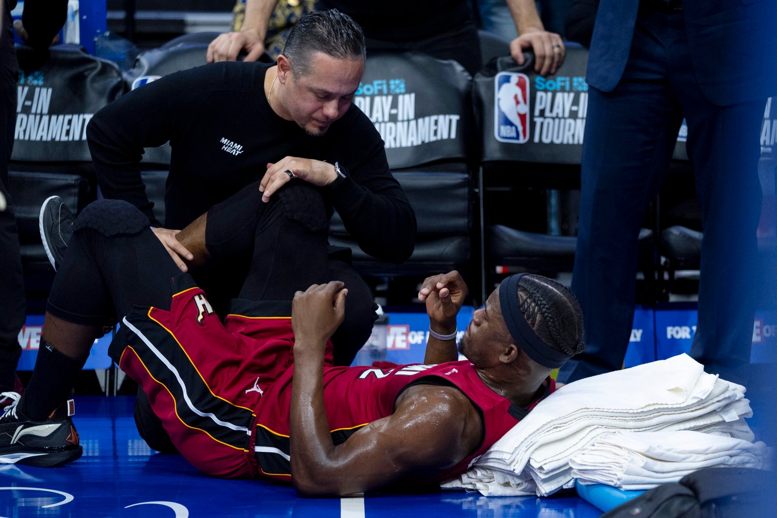 Heat guard Jimmy Butler injures knee in play-in loss