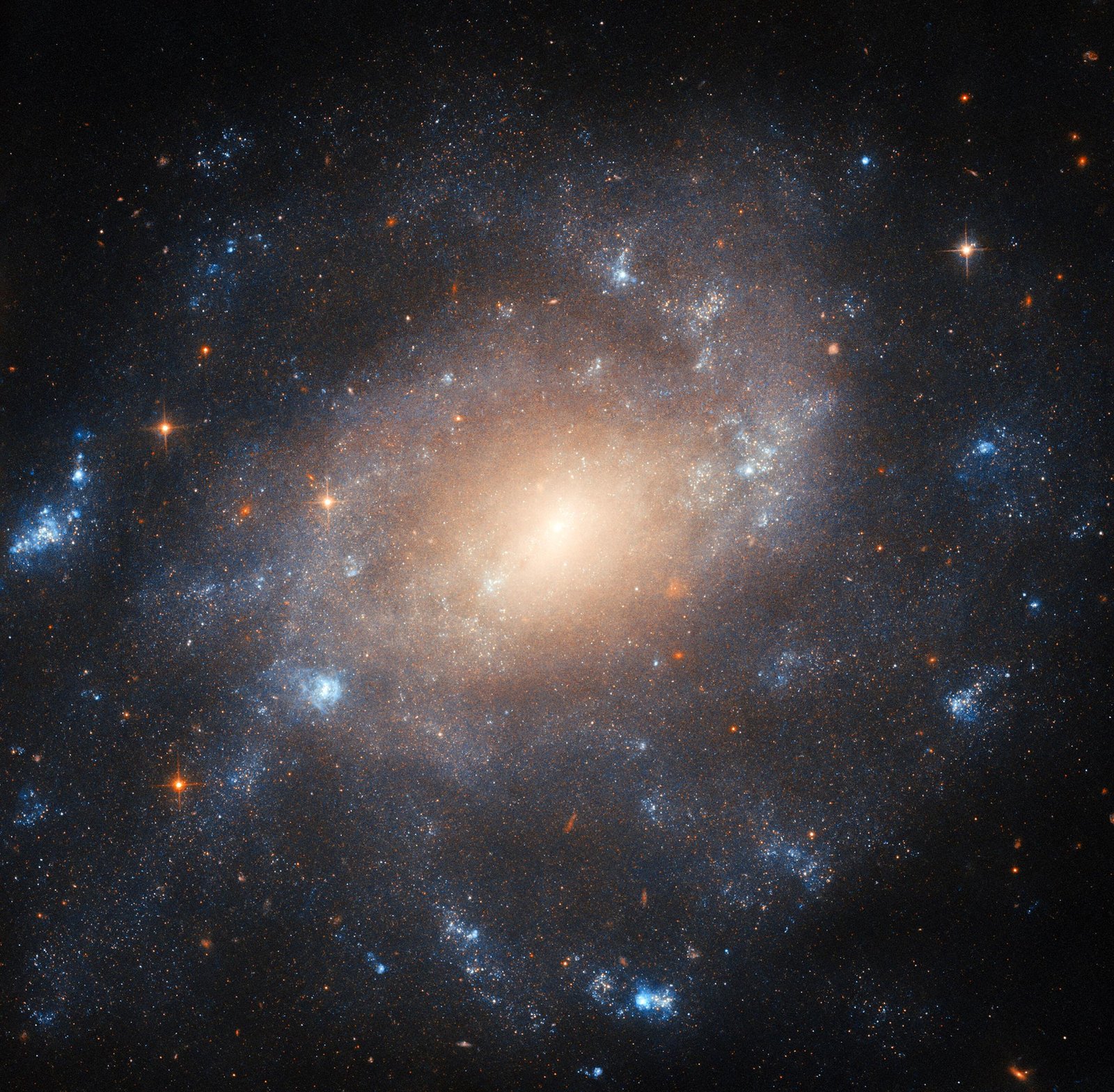 Hubble Unmasks the Luminous Core of a Historic Spiral Galaxy