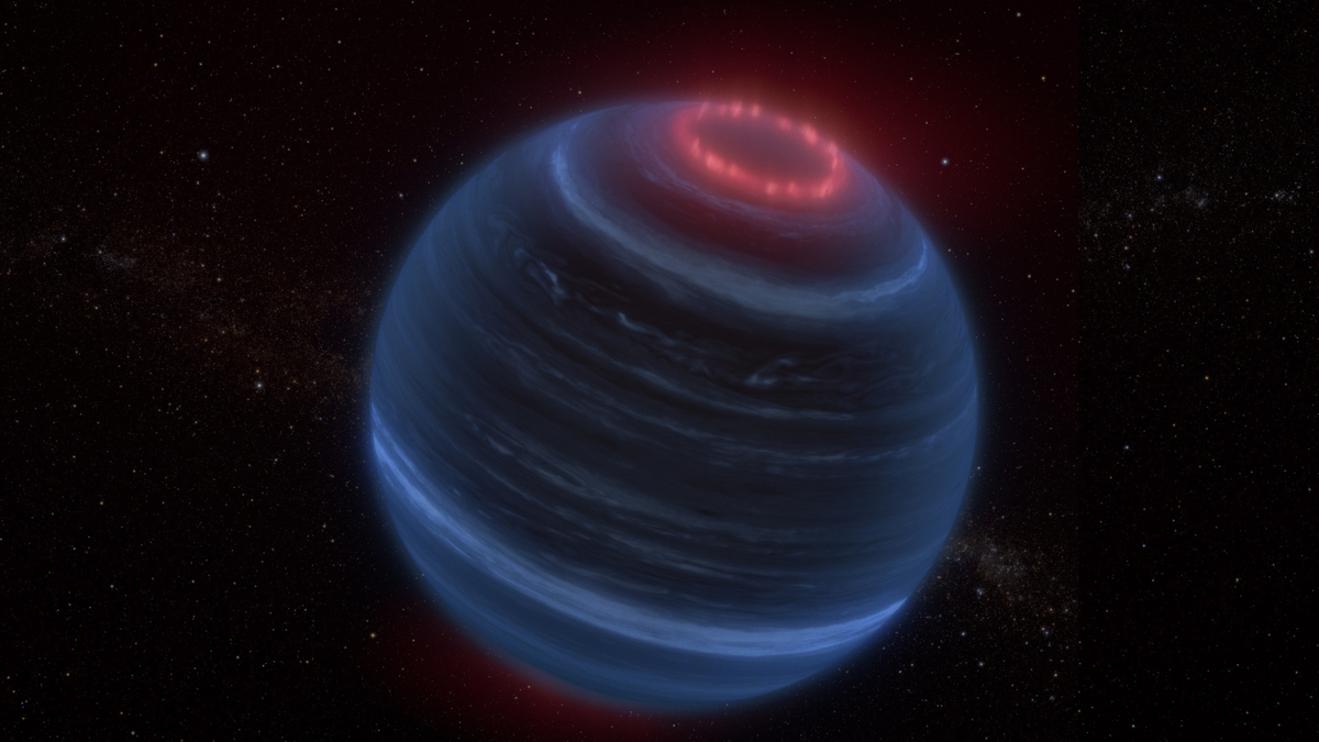 An illustration of a brown dwarf with a ring of reddish auroral emissions at its north pole