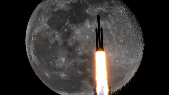 SpaceX Falcon Heavy rocket photobombs the moon in incredible award winning shot