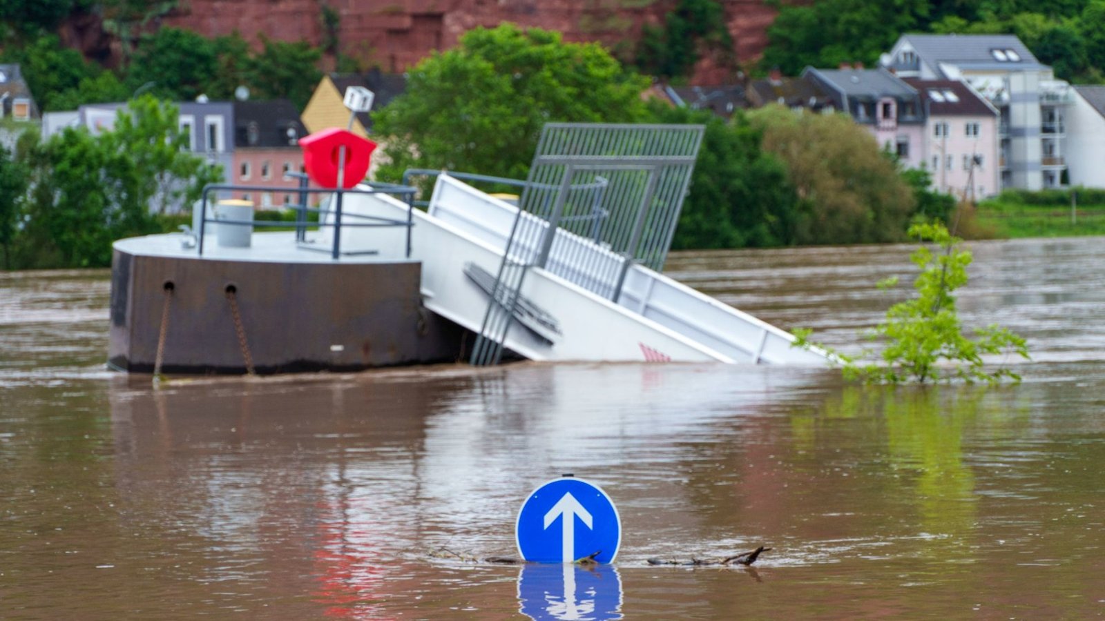 Devastating floods sweep German town turning roads into rivers as city sends out emergency alerts after heavy rain
