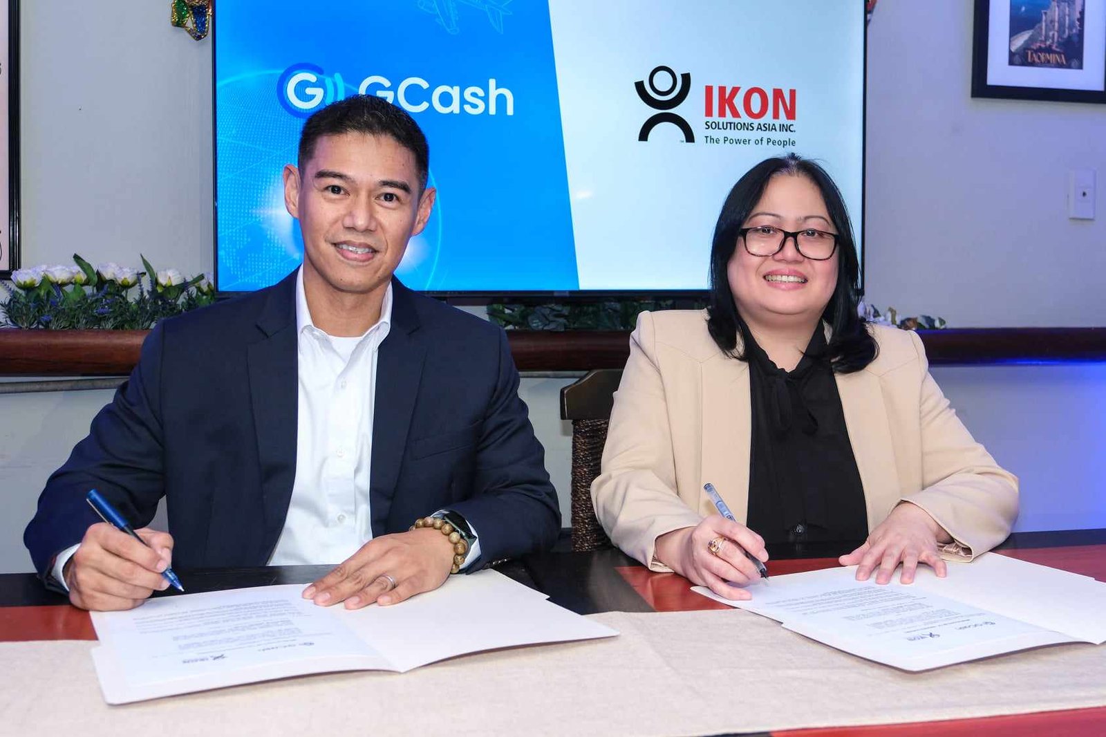 GCash, manpower firm IKON team up to extend digital financial services to OFWs