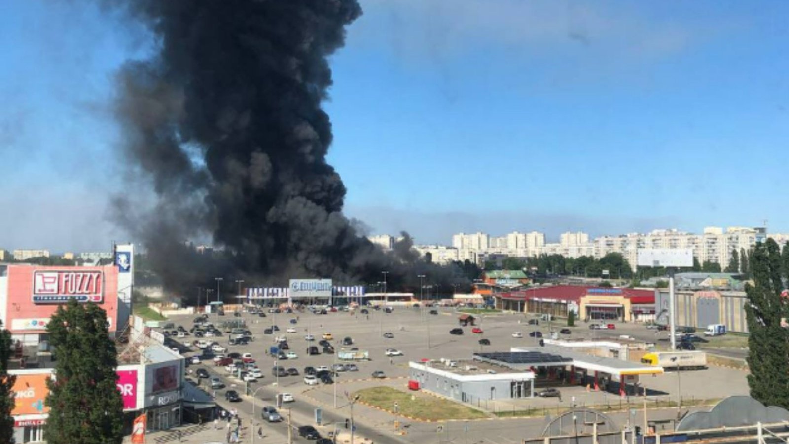Huge inferno as Russian missiles strike Ukrainian retail park packed with hundreds of civilians leaving many feared dead