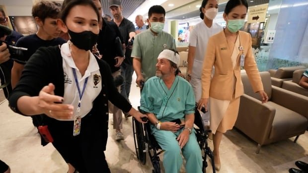 Spinal surgeries needed for 22 on board turbulent Singapore Airlines flight hospital says