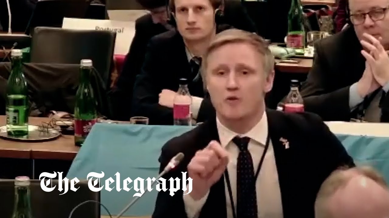 ‘Go **** yourself”: Latvian MP rages after Russian delegation speaks at security summit