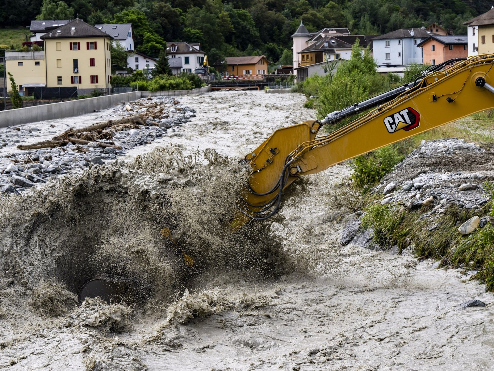 3 missing in a landslide in Swiss Alps as heavy rains cause flash floods | Floods News