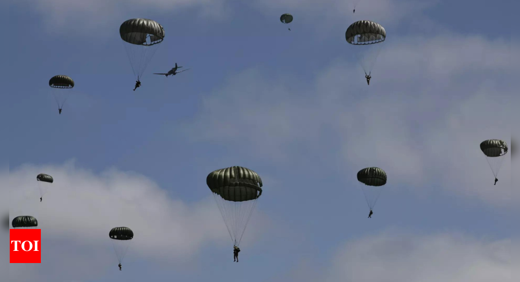 A mass parachute jump over Normandy kicks off commemorations for the 80th anniversary of D Day