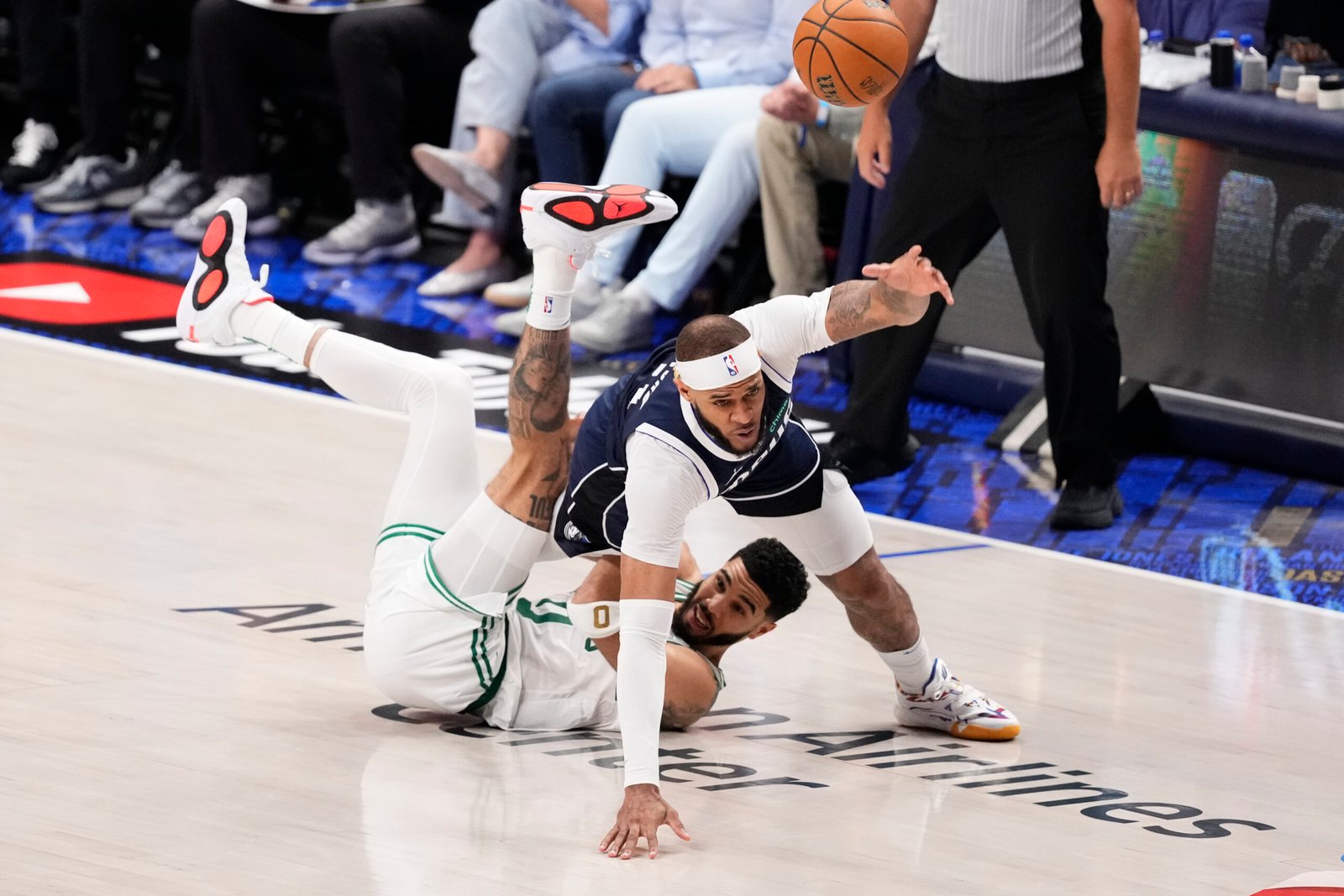 Celtics knocked down hard, but with chance to clinch at home
