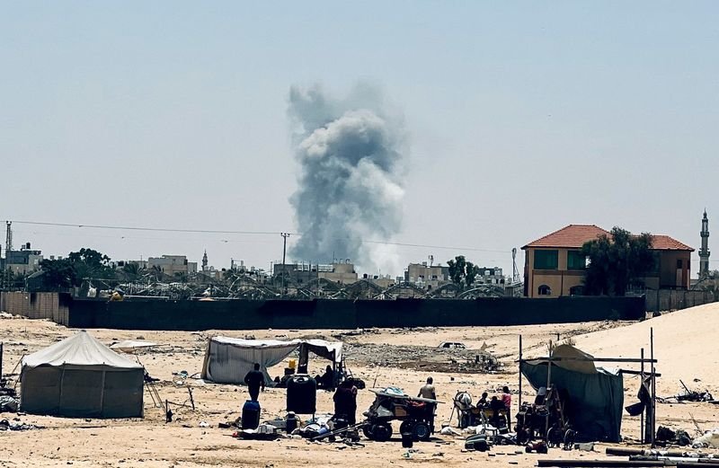 Smoke rises following Israeli strikes in Rafah