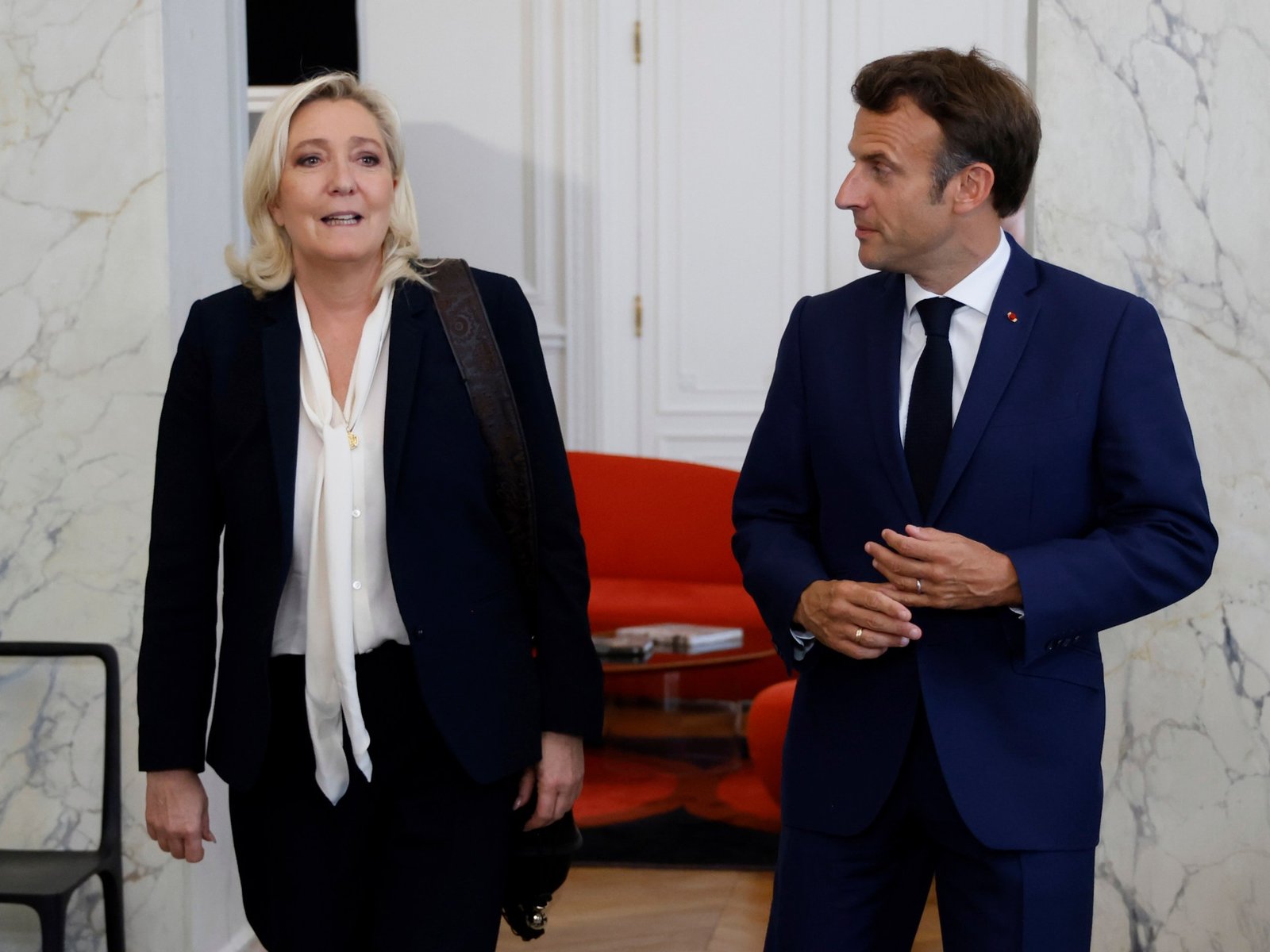 Frances far right leader Le Pen questions Macrons role as army chief | Politics News