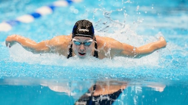 Gretchen Walsh sets world record in 100m butterfly at U.S. Olympic swim trials