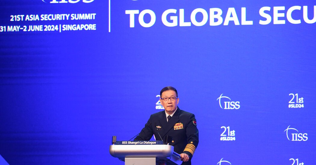 In Singapore, China Warns U.S. While Zelensky Seeks Support
