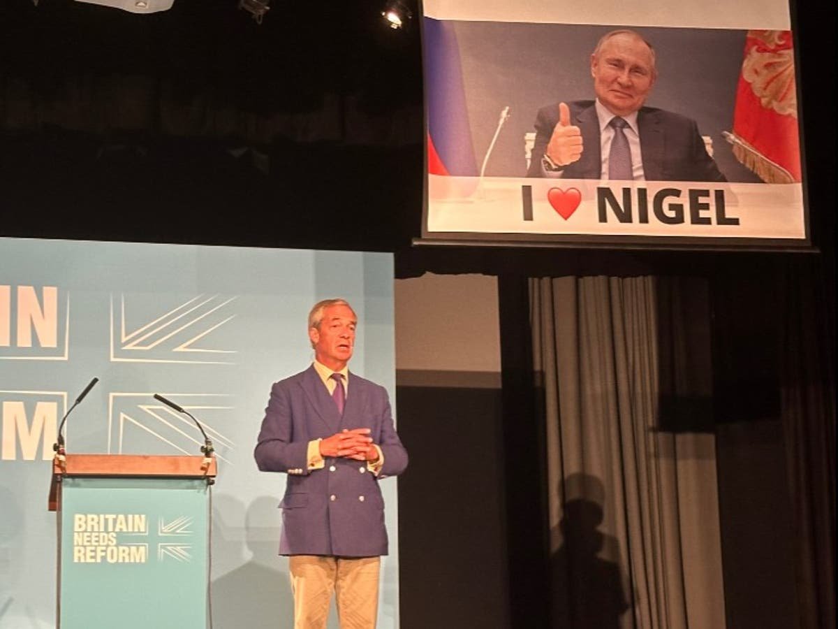 Led by Donkeys interrupt Nigel Farage speech by lowering huge Putin banner