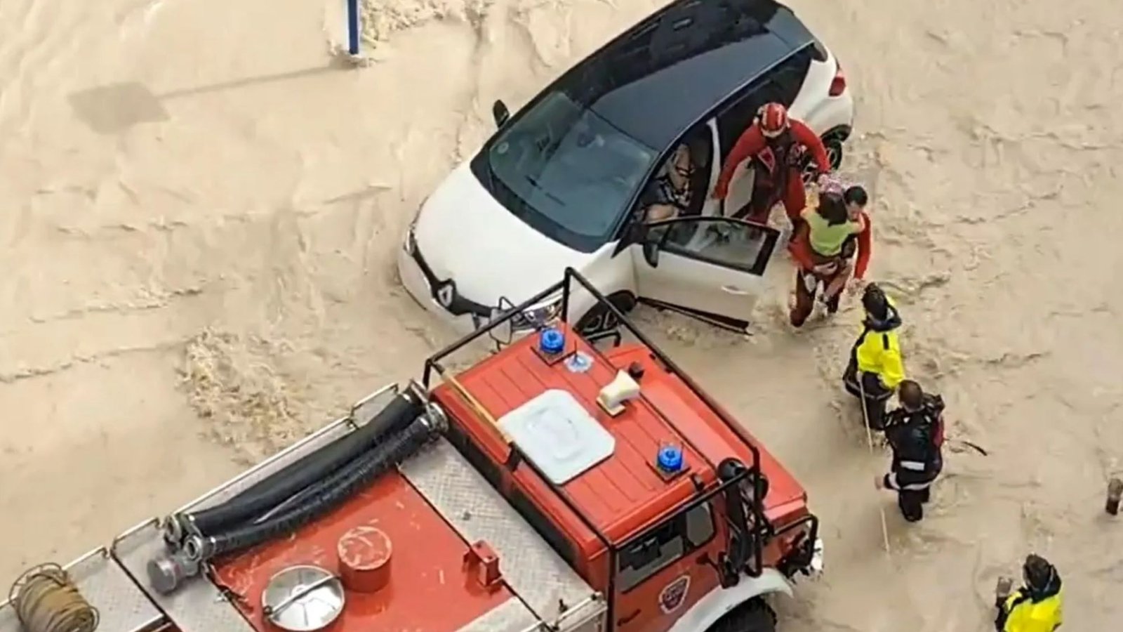 Major rescue operation at holiday hotspot as heavy flooding leaves drivers trapped in cars after Majorca airport chaos