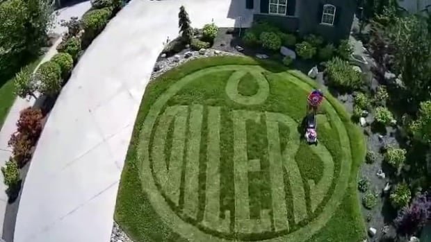 Oilers fan shows team love by mowing logo into his lawn