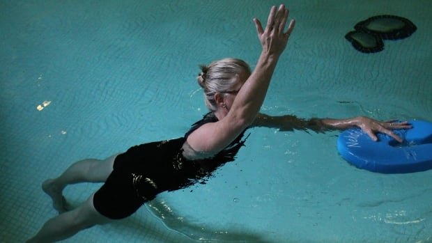 People with back pain often shy away from movement Getting in the water may help experts say