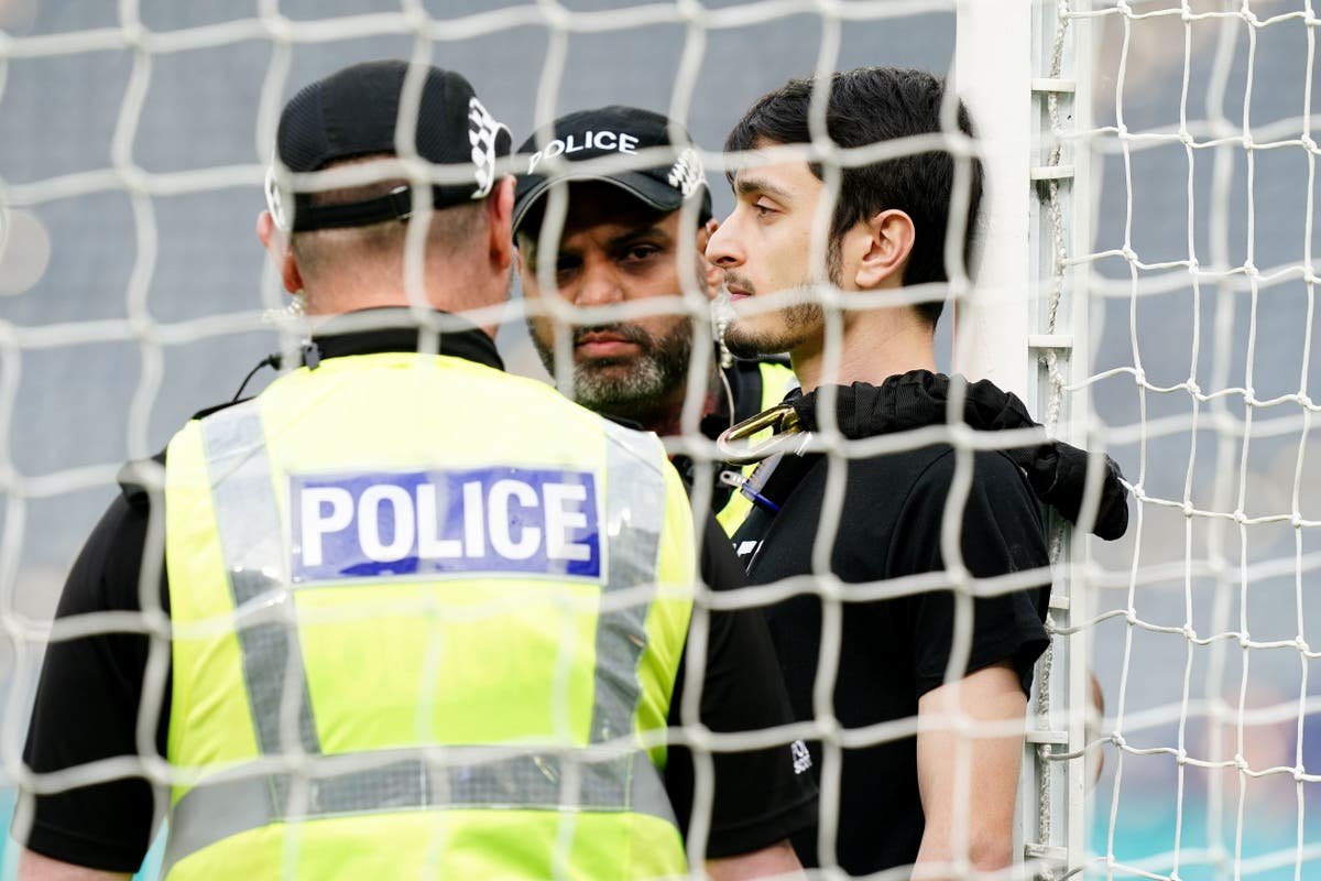 Protester ties himself to Hampden goalpost to delay Scotland Israel football match