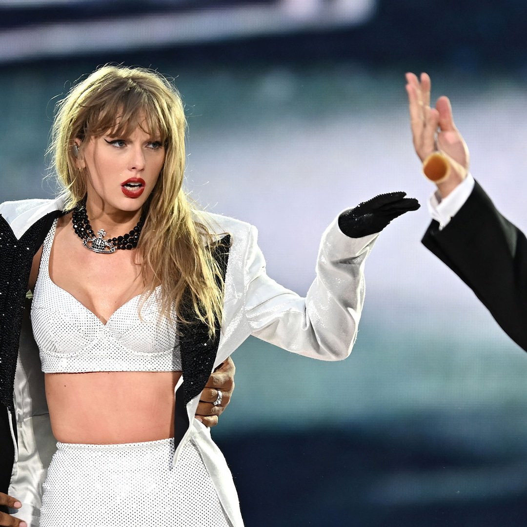 Travis Kelce Makes Surprise Onstage Appearance at Taylor Swifts Show