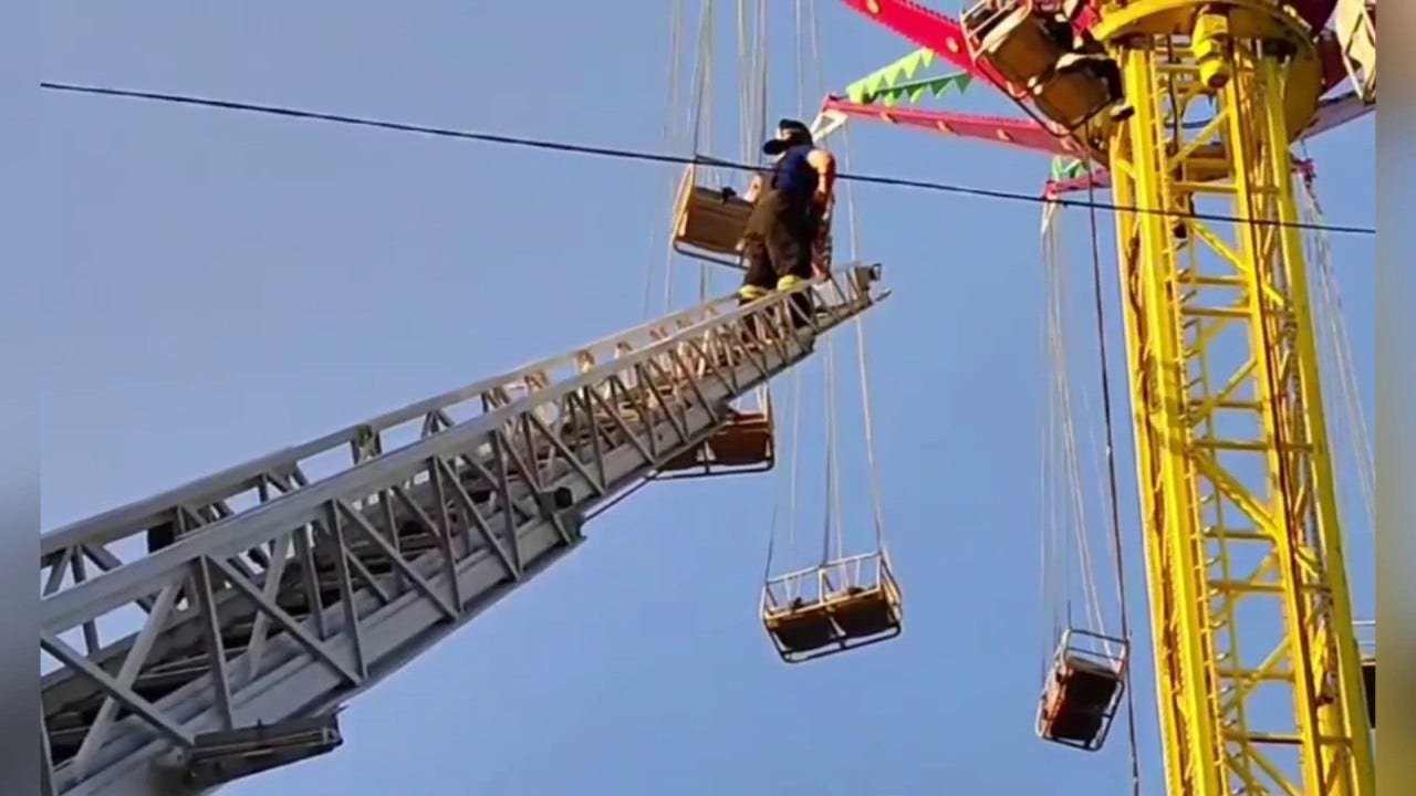 WATCH Russian amusement park ride malfunctions trapping a dozen people 50 feet in the air