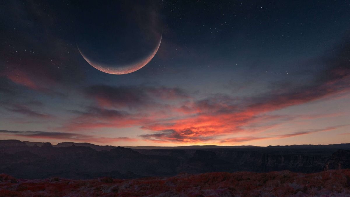 a giant crescent moon hangs like a dim red bowl in a darkening re clouded sky A dark hilly landscape stretches beneath