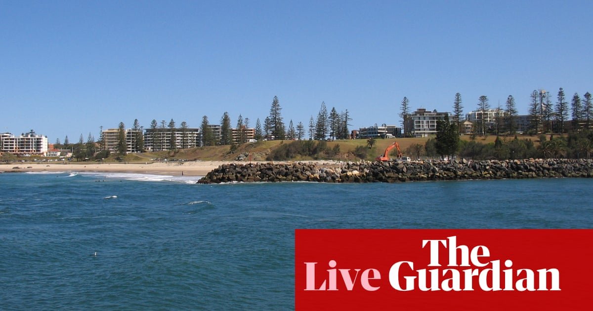 Australia news live: ‘serious shark incident’ closes NSW beach; four charged over alleged pump and dump share scheme | Australia news