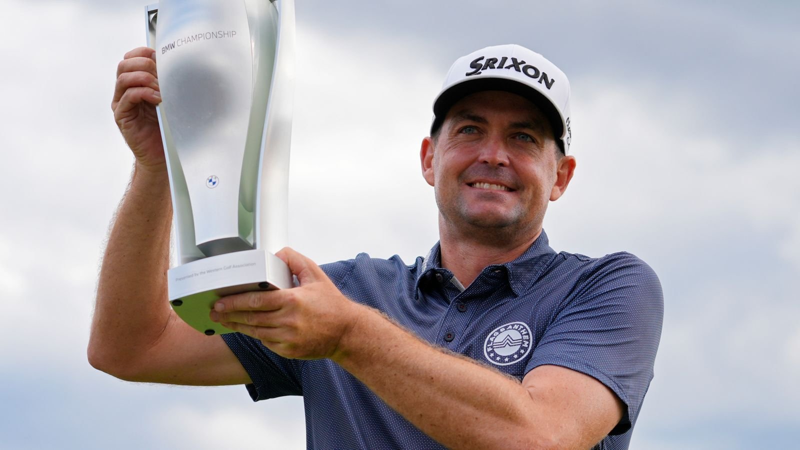 Keegan Bradley holds up the BMW Championship trophy after winning the BMW Championship golf event at Castle Pines Golf Club, Sunday, Aug. 25, 2024, in Castle Rock, Colo. (AP Photo/Matt York)