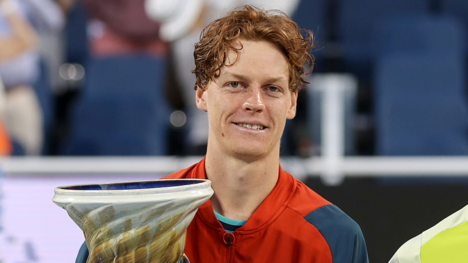 CINCINNATI, OH - AUGUST 19: Jannik Sinner of Italy poses with the Rookwood Cup and Frances Tiafoe. Sinner defeated Tiafoe to win the final round of the Cincinnati Open on August 19, 2024, at the Lindner Family Tennis Center in Mason, OH. (Photo by Ian Johnson/Icon Sportswire) (Icon Sportswire via AP Images)