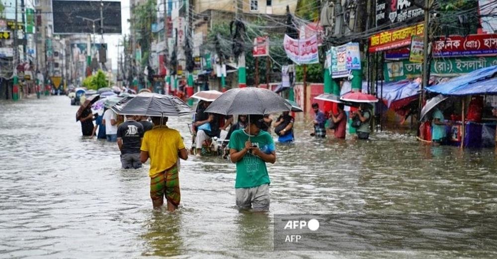 Floods swamp Bangladesh as nation finds its feet after protests